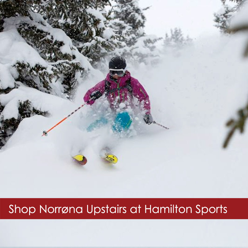Noronna-ski-wear-woman Woman skiing on Aspen mountain wearing Norrona ski wear bought from Hamilton Sports ski shop