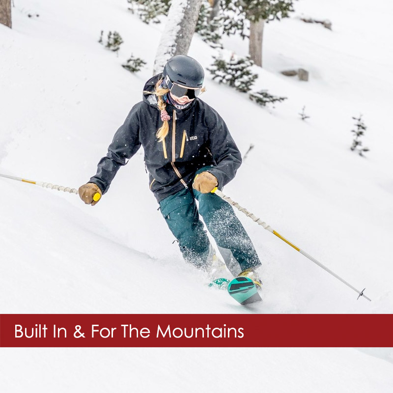 Woman in Stio ski wear skiing on Aspen Mountain