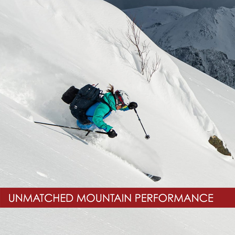 woman skiing wearing Norrona ski apparel