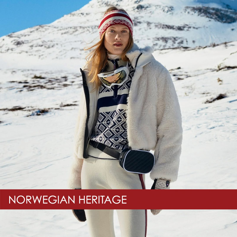 woman-wearing-dale-of-norway-ski-sweater woman wearing a Dale of Norway ski sweater standing on ski slopes